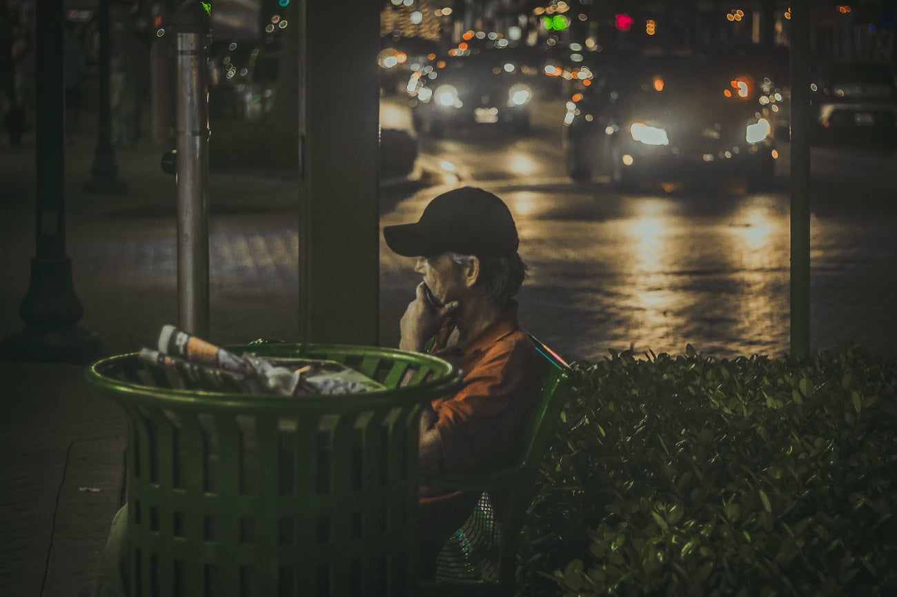 A face in the city night. Photograph by Robin Mehdee.