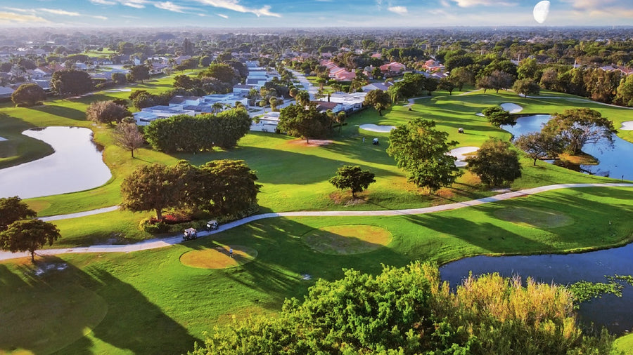 Fairways and a rising moon. Photograph by Robin Mehdee.