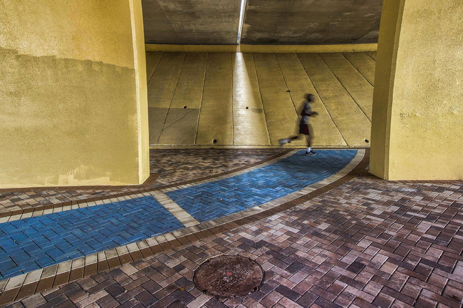 A runner under the bridge. Photograph by Robin Mehdee.