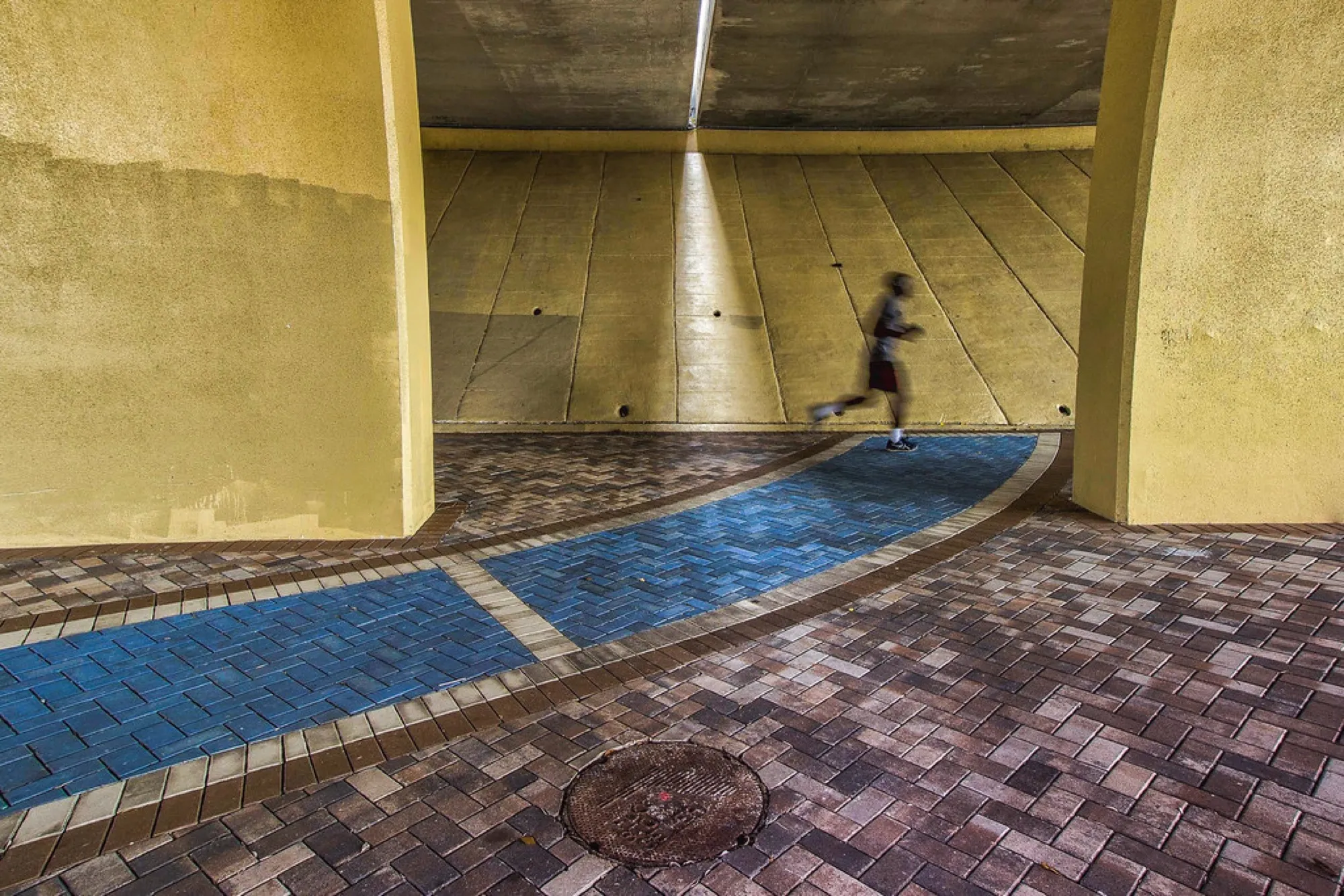 A runner under the bridge. Misc photography, South Florida.