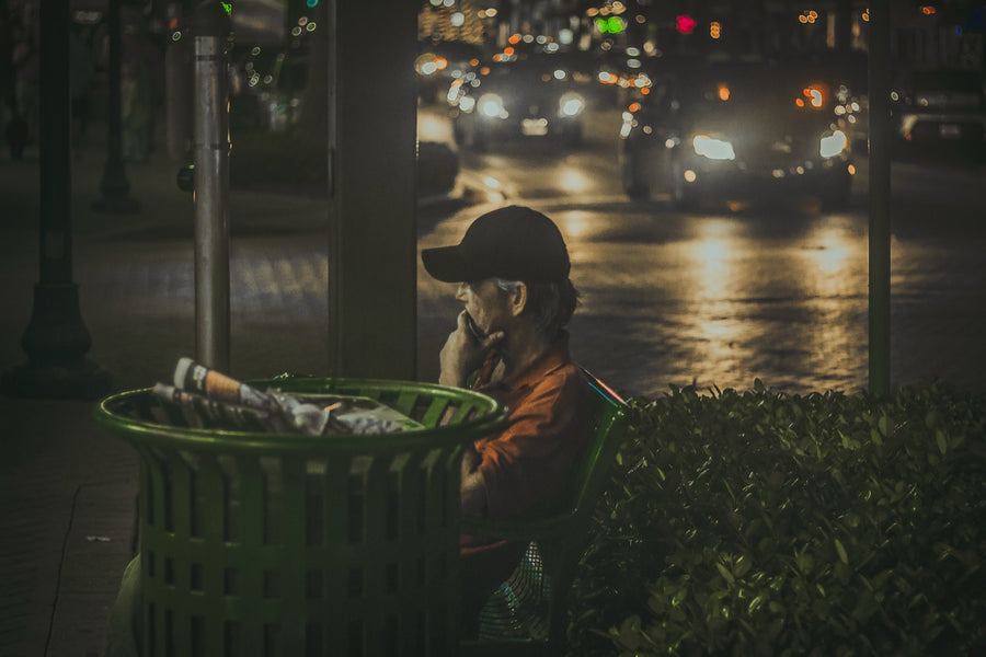 A face in the city night. Photograph by Robin Mehdee.