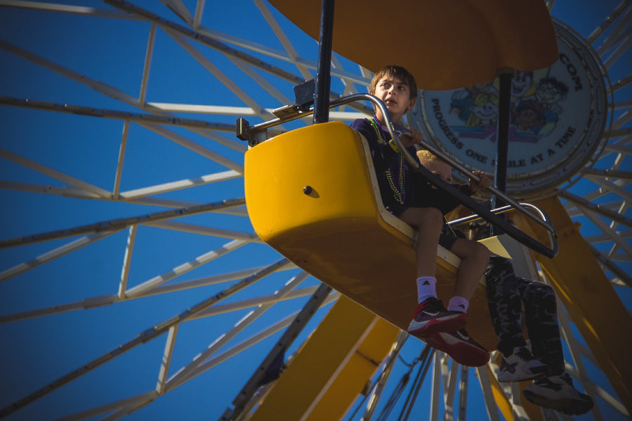 At the fair, blue sky. Photograph by Robin Mehdee.