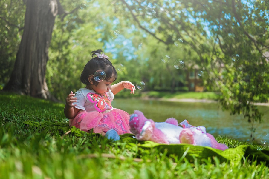 Chasing bubbles. Photograph by Robin Mehdee.